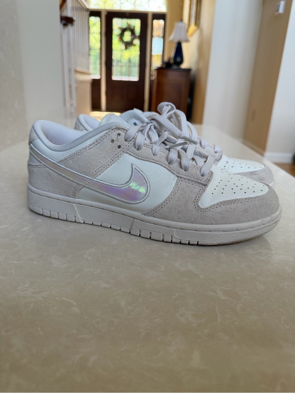 Nike Women's Dunk Low White and Gray Sneakers with Iridescent Swoosh